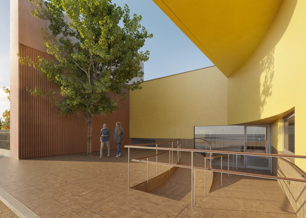 A pequena praça de acesso se conforma pela relação entre o volume de apoio, que recebe diversas instalações, e o corpo principal da edificação e empresta singelo caráter cívico à fachada do anexo ao Museu Casa Lacerda.