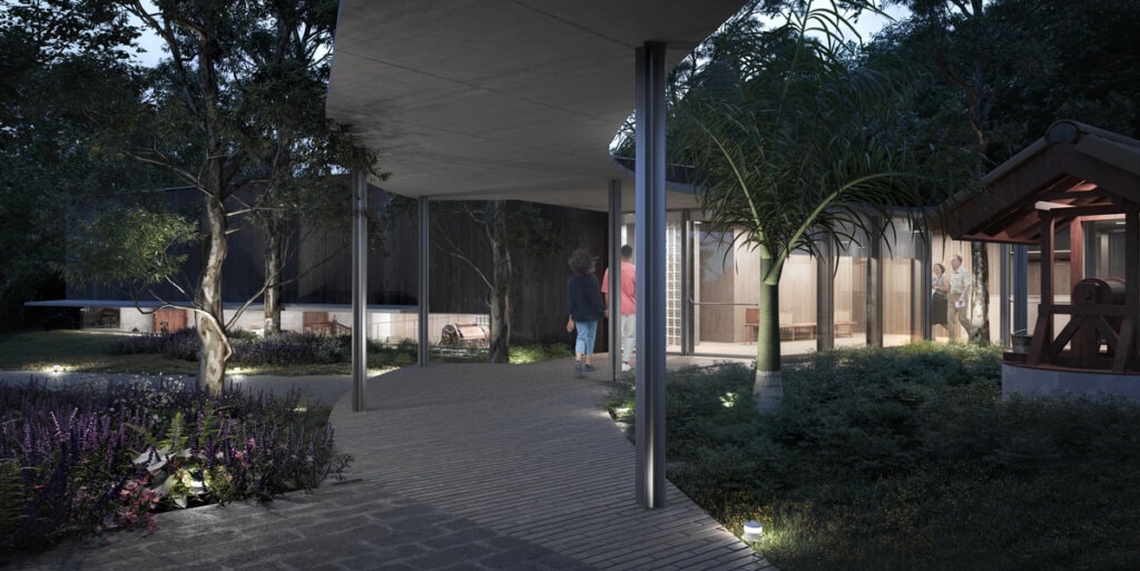 The buildings are connected by a slender marquee that marks the transition between the front garden, marked by the presence of the restored well, and the back garden, with its characteristic lawn.